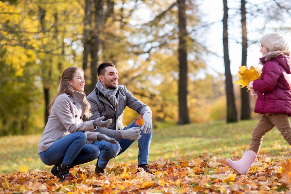 Parents Enjoying With Their Child