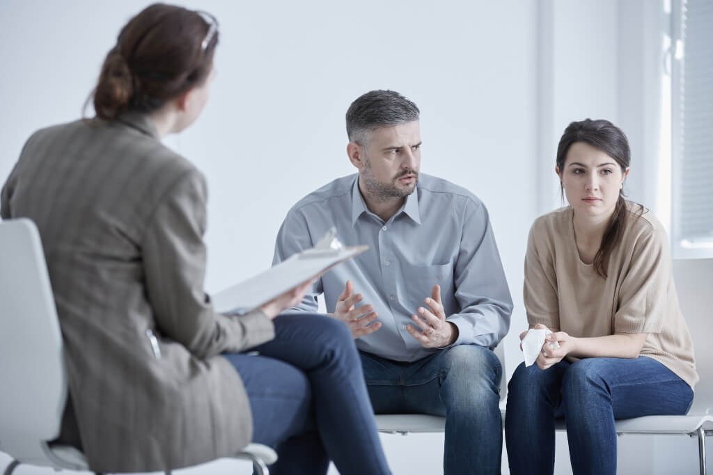 Lawyer Discussing With Her Client